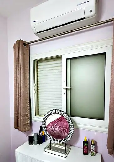 Air conditioner and dressing table
