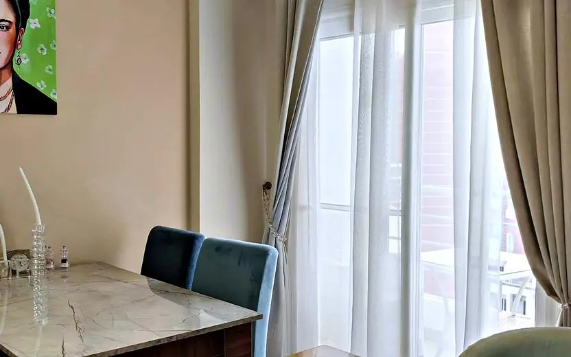 Balcony door with light curtains