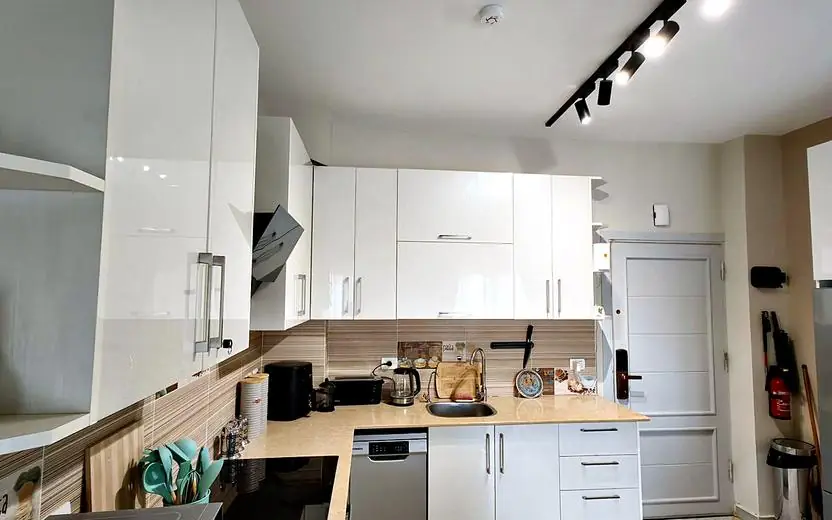 Open-plan kitchen, wide view